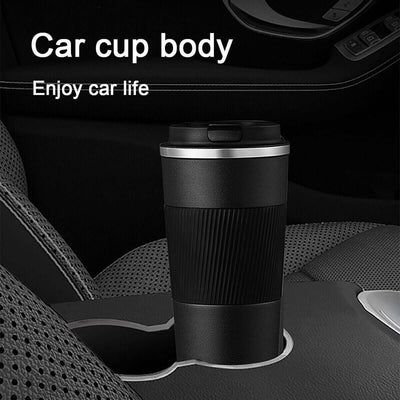 Black insulated travel mug holder in car console, designed for coffee on-the-go, perfect for enjoying drinks while driving.